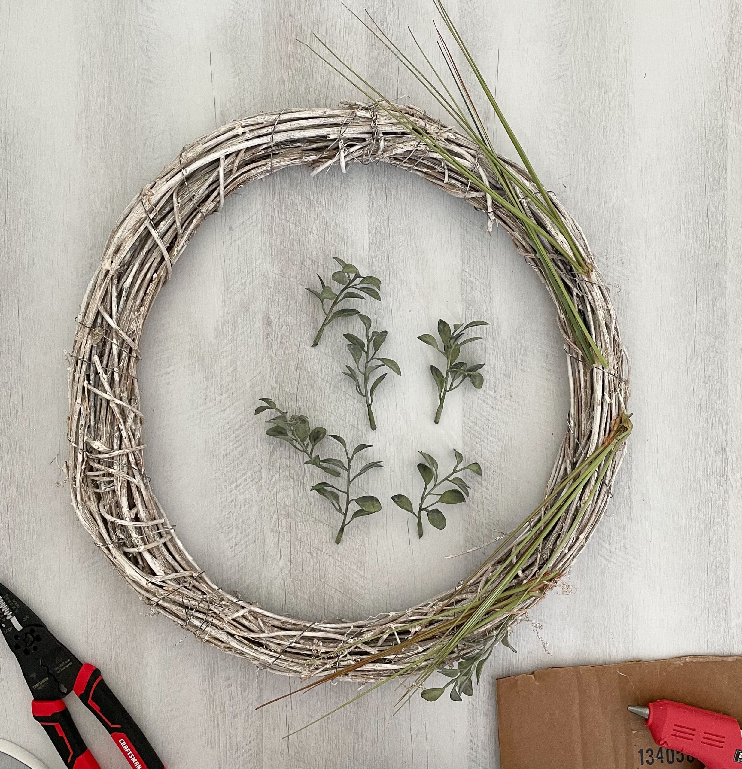 Coastal wreath with greenery ready to be placed