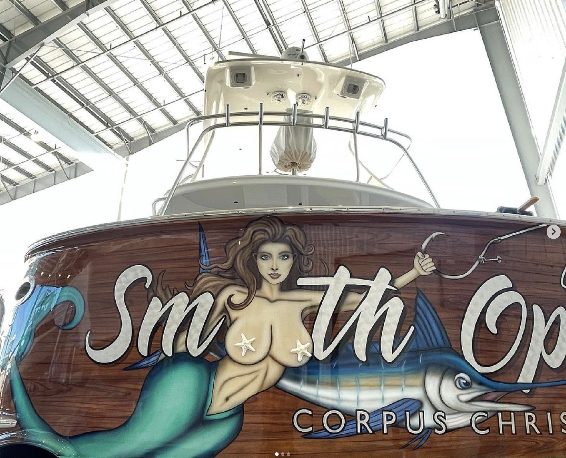 mermaid and lettering on back of boat, art by monique richter