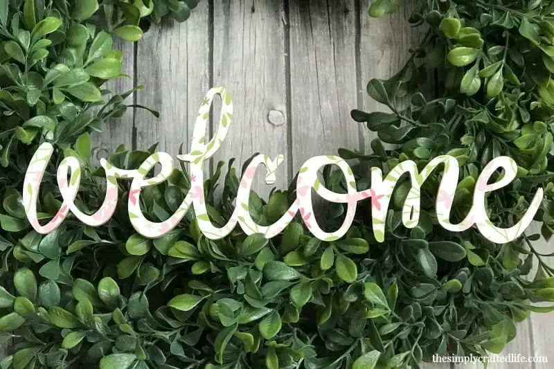 Cricut made welcome sign on wreath